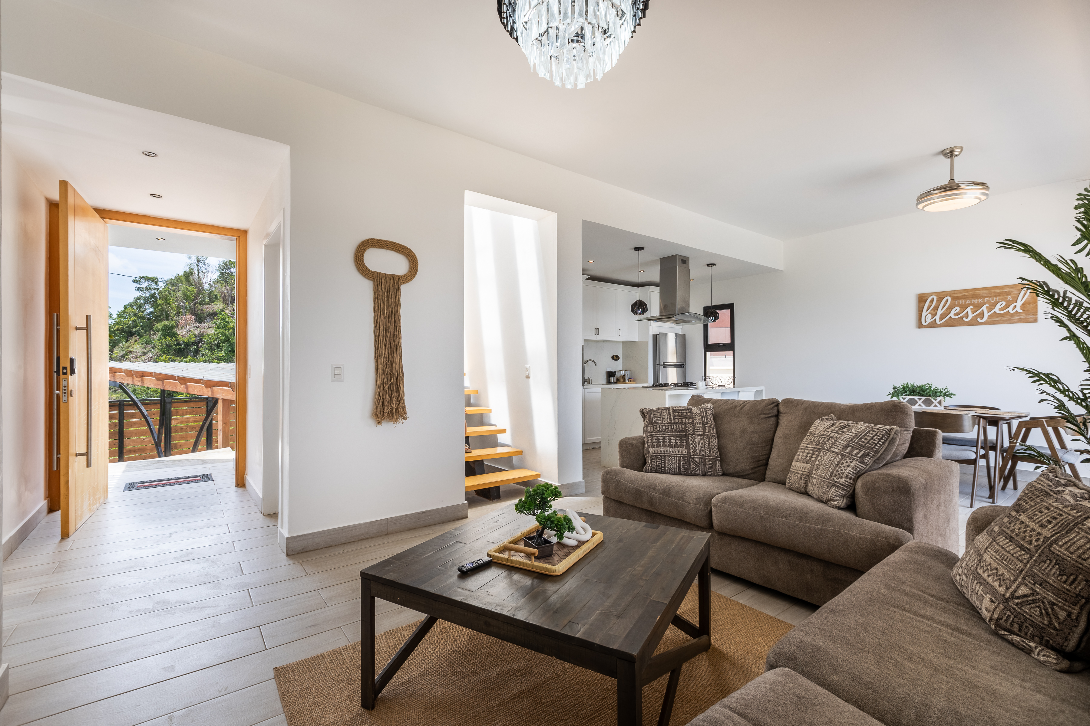 Full open-plan ground floor: entrance, living, kitchen and dining